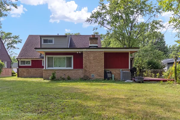 a view of house with outdoor space