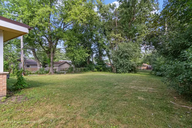 a view of outdoor space and yard