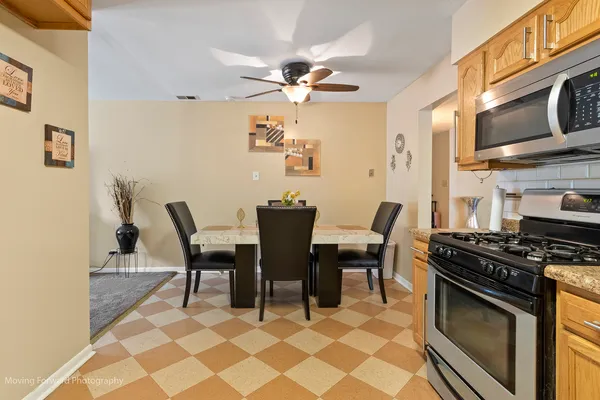 a view of a dining room with furniture