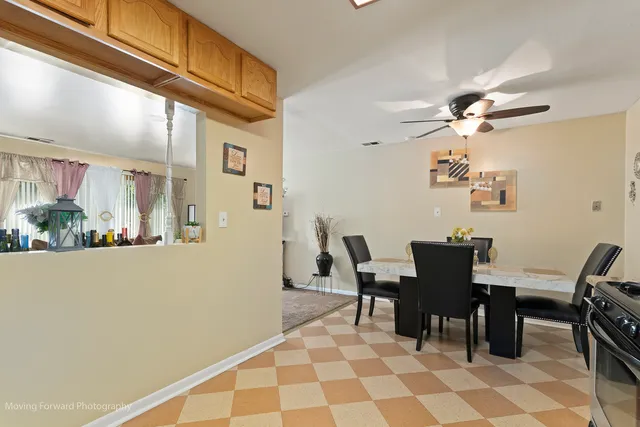 a view of a dining room with furniture