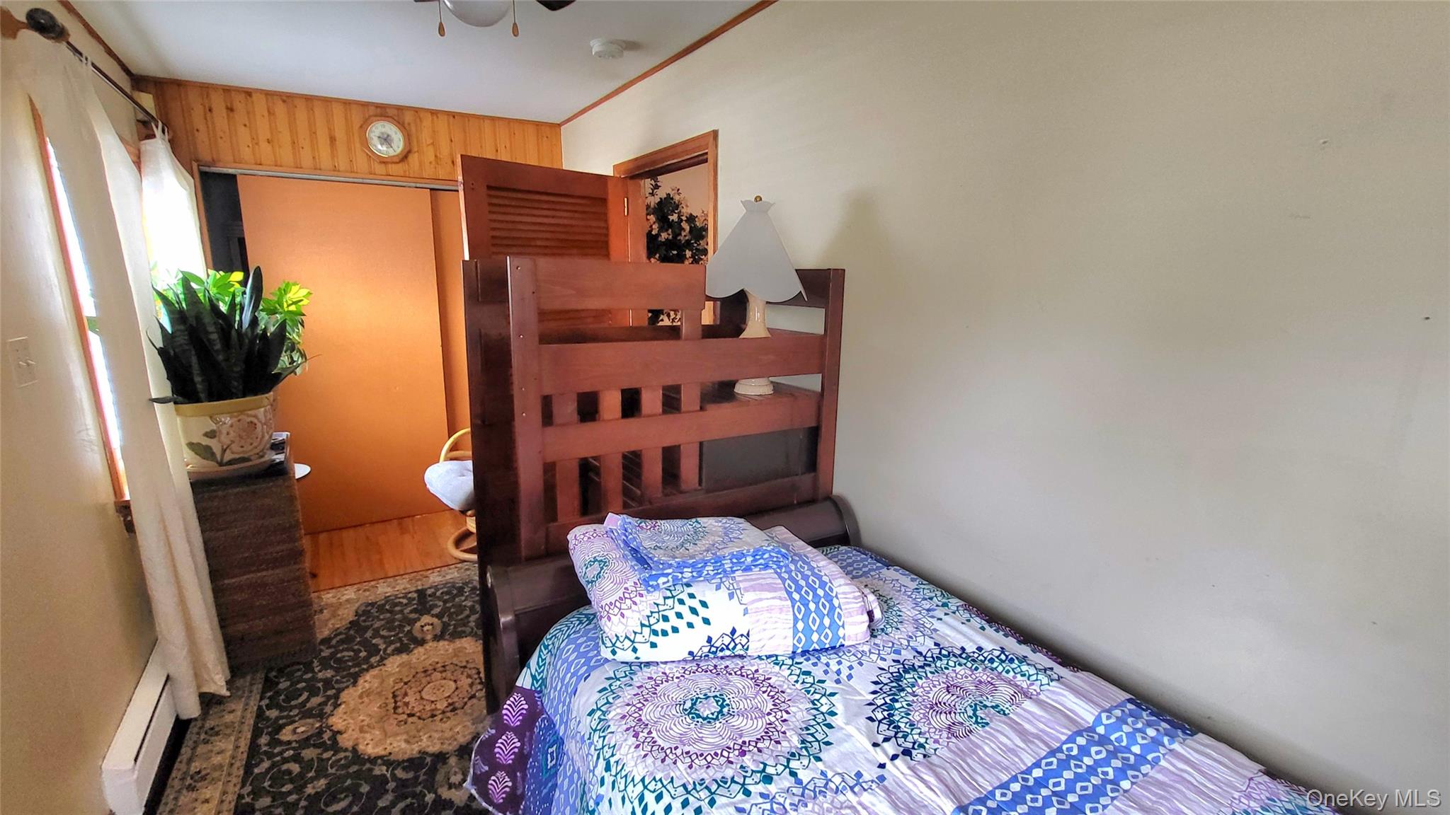 1 Lawrence Road Poughkeepsie, NY 12601 - Photo 14 of 36 a bedroom with a bed and a potted plant