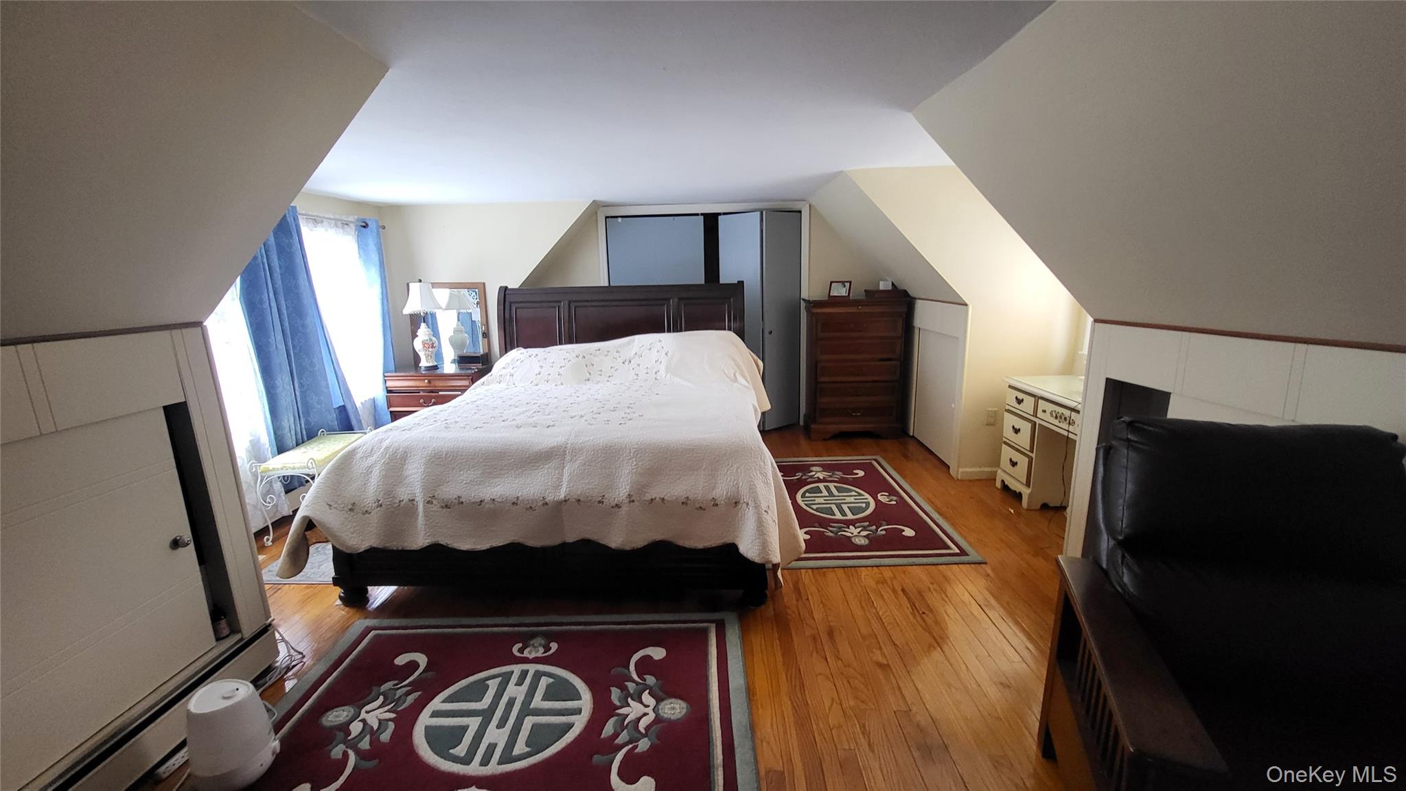 1 Lawrence Road Poughkeepsie, NY 12601 - Photo 17 of 36 a bedroom with a bed and a mirror on dresser