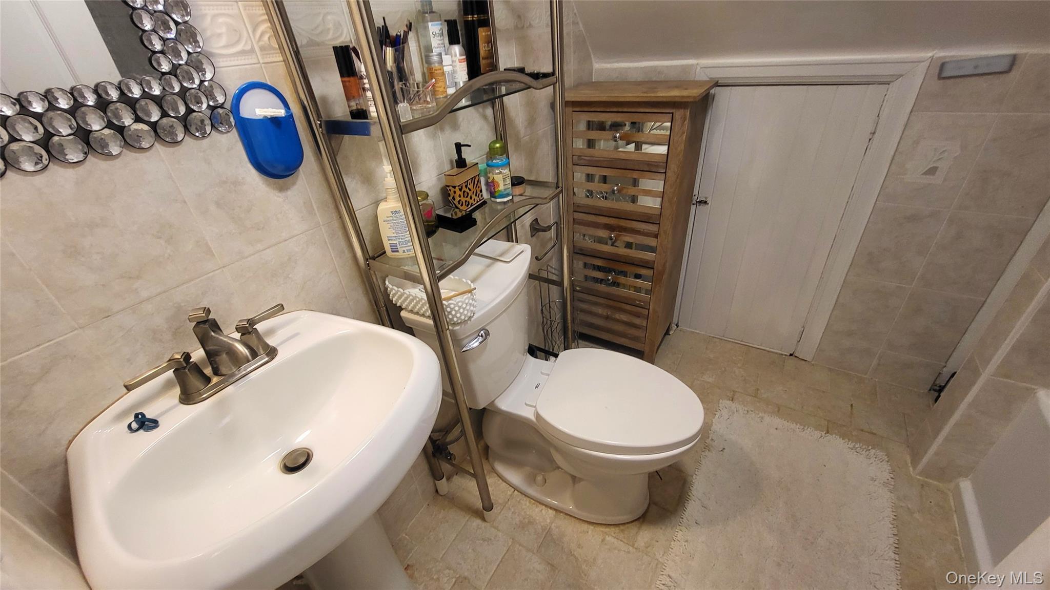 1 Lawrence Road Poughkeepsie, NY 12601 - Photo 18 of 36 a bathroom with a toilet and a sink