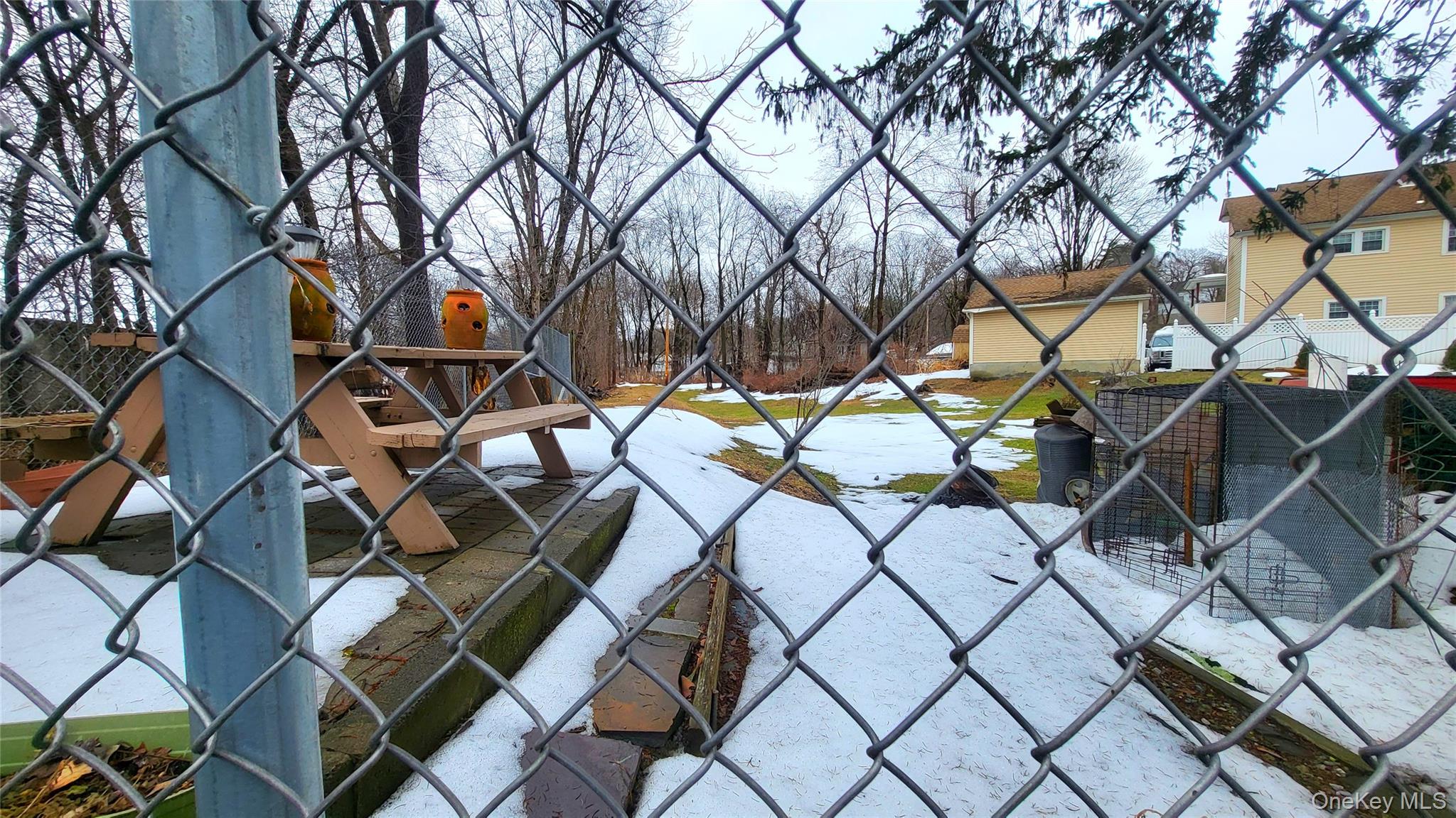 1 Lawrence Road Poughkeepsie, NY 12601 - Photo 31 of 34 a backyard of a house with barbeque oven table and chairs