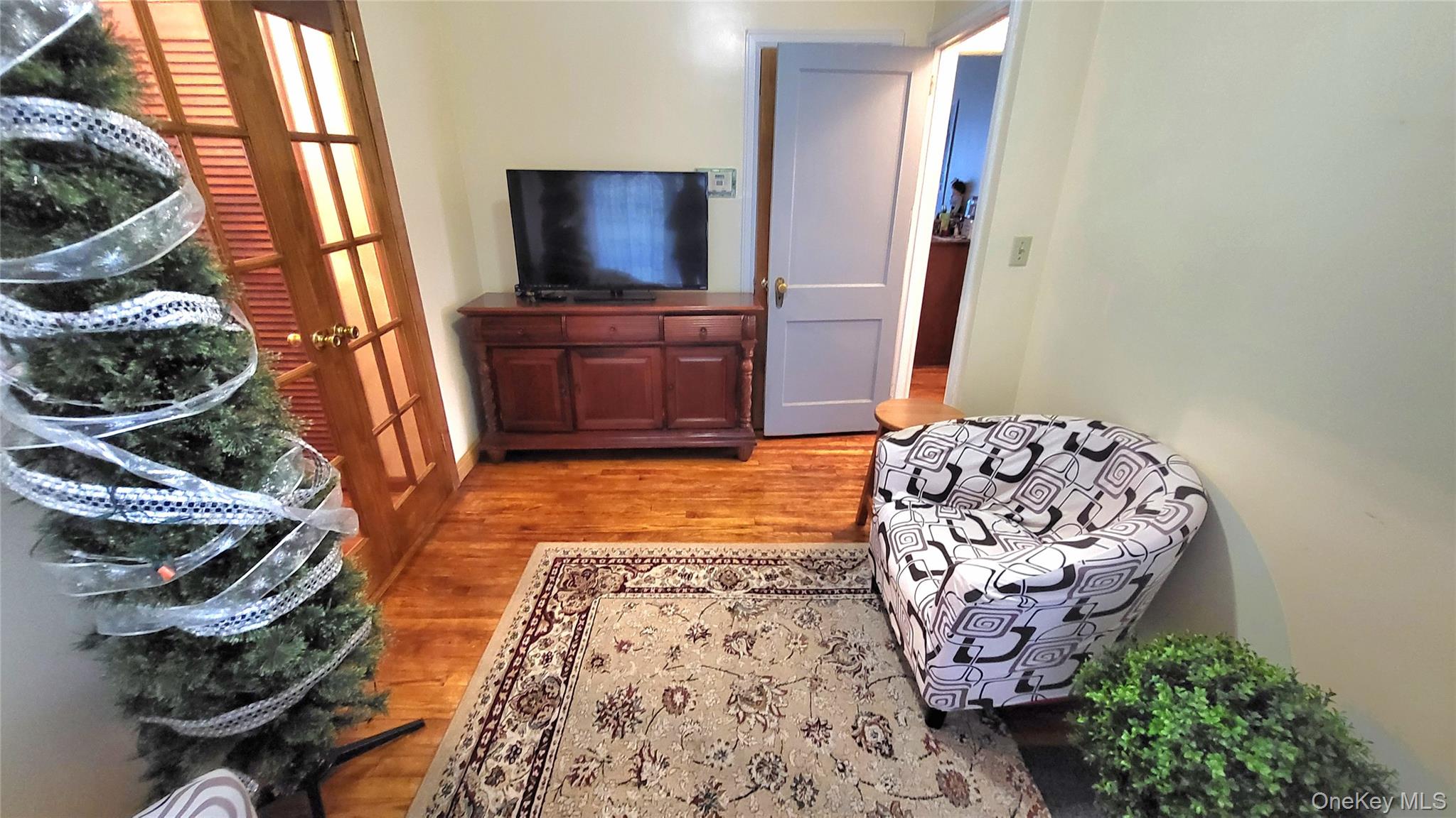 1 Lawrence Road Poughkeepsie, NY 12601 - Photo 8 of 36 a living room with furniture and a flat screen tv