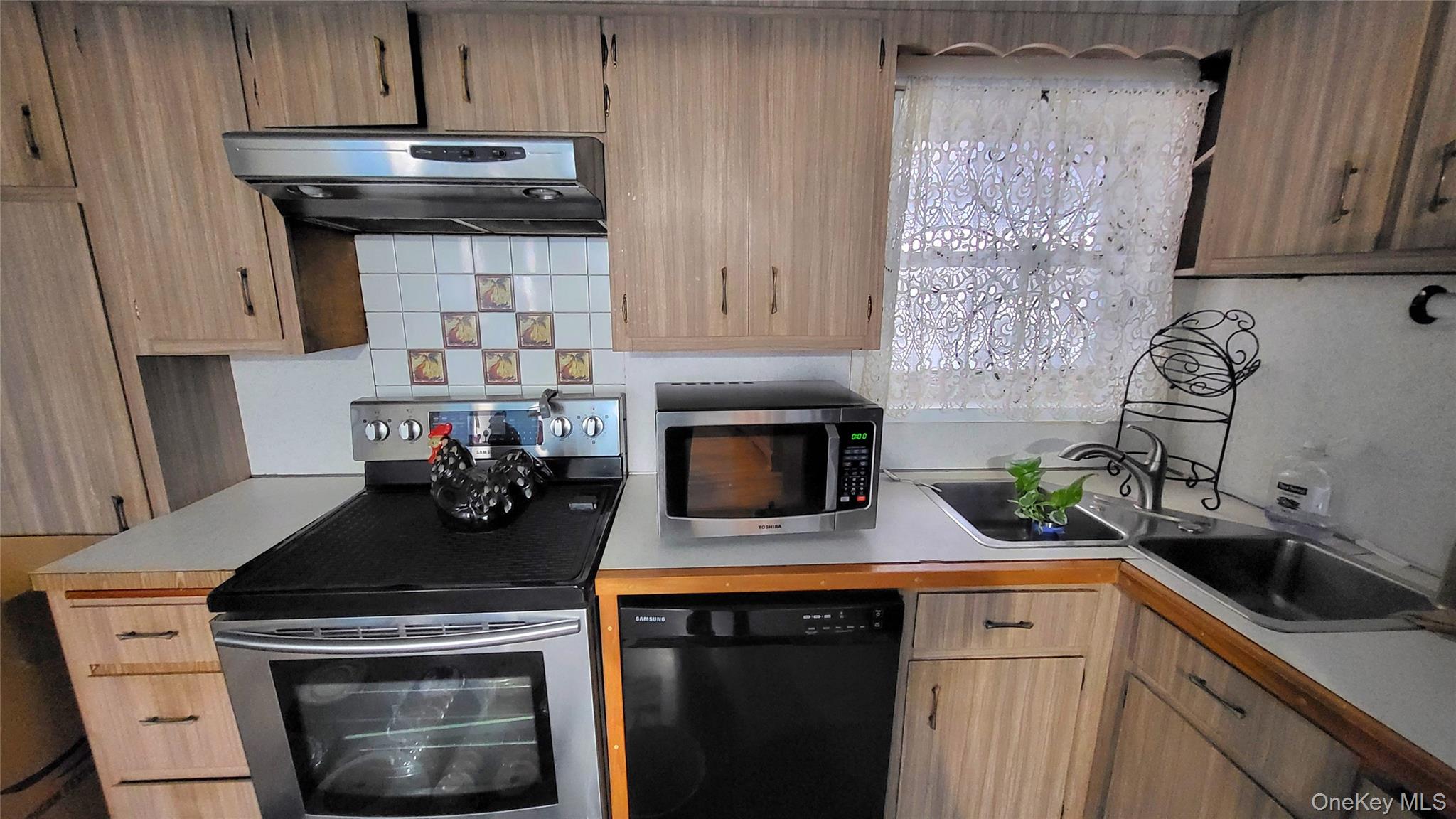 1 Lawrence Road Poughkeepsie, NY 12601 - Photo 10 of 36 a kitchen with a stove and a sink