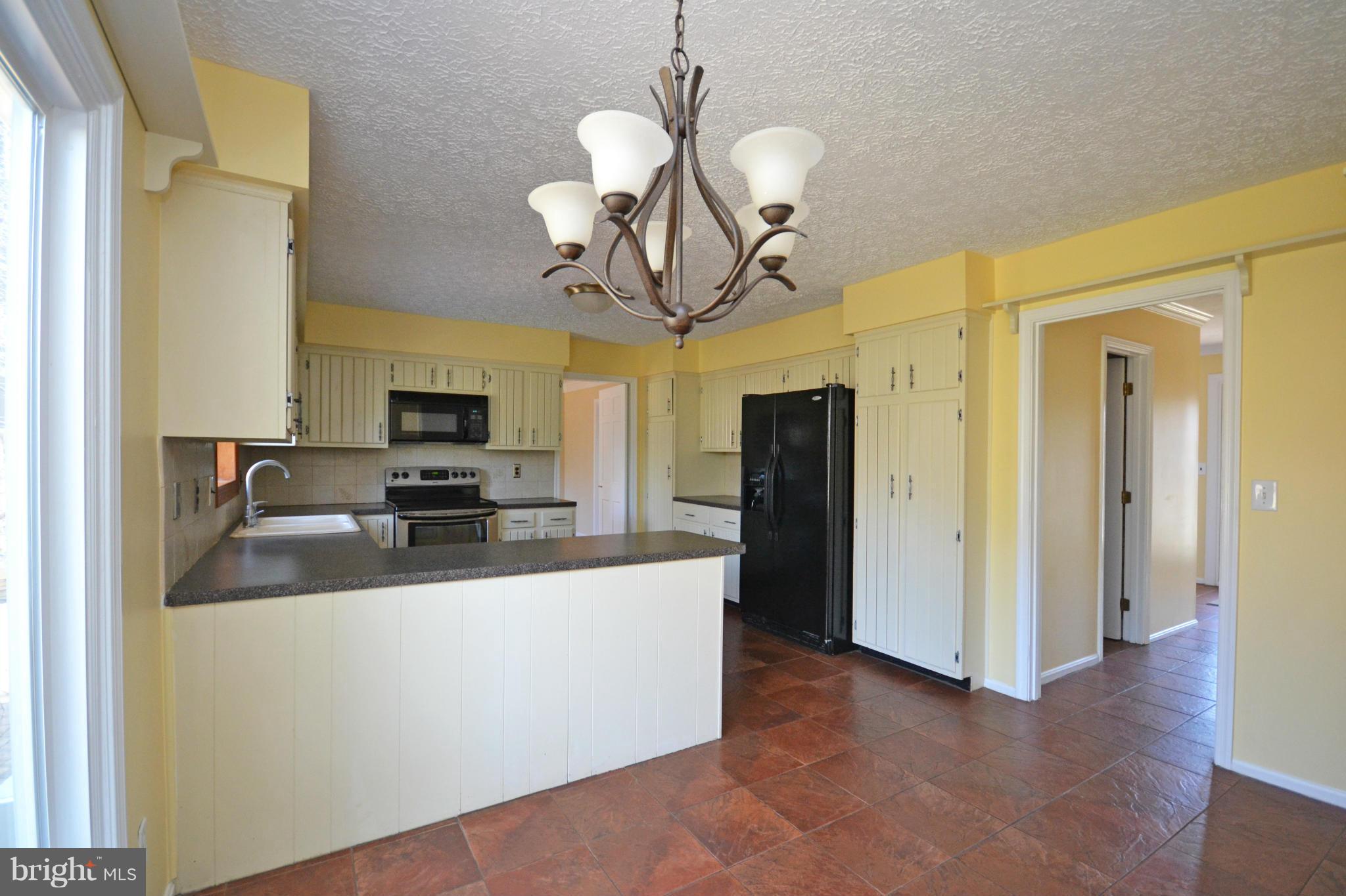 12909 Gent Road Reisterstown, MD 21136 - Photo 11 of 29 Kitchen with light cabinets and recent appliances