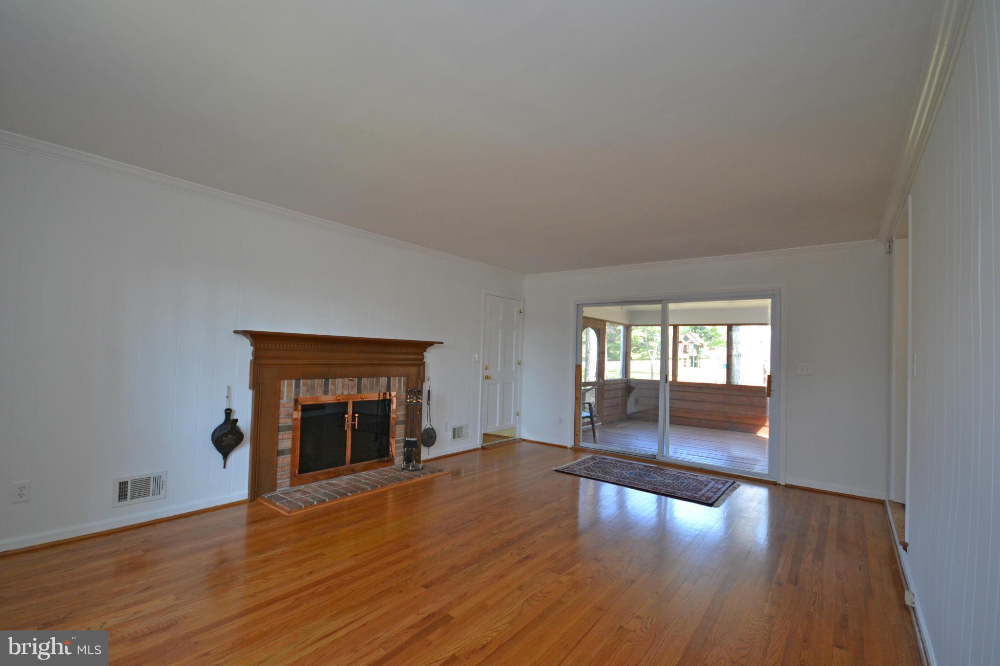 12909 Gent Road Reisterstown, MD 21136 - Photo 13 of 29 Family Room with wood burning fireplace