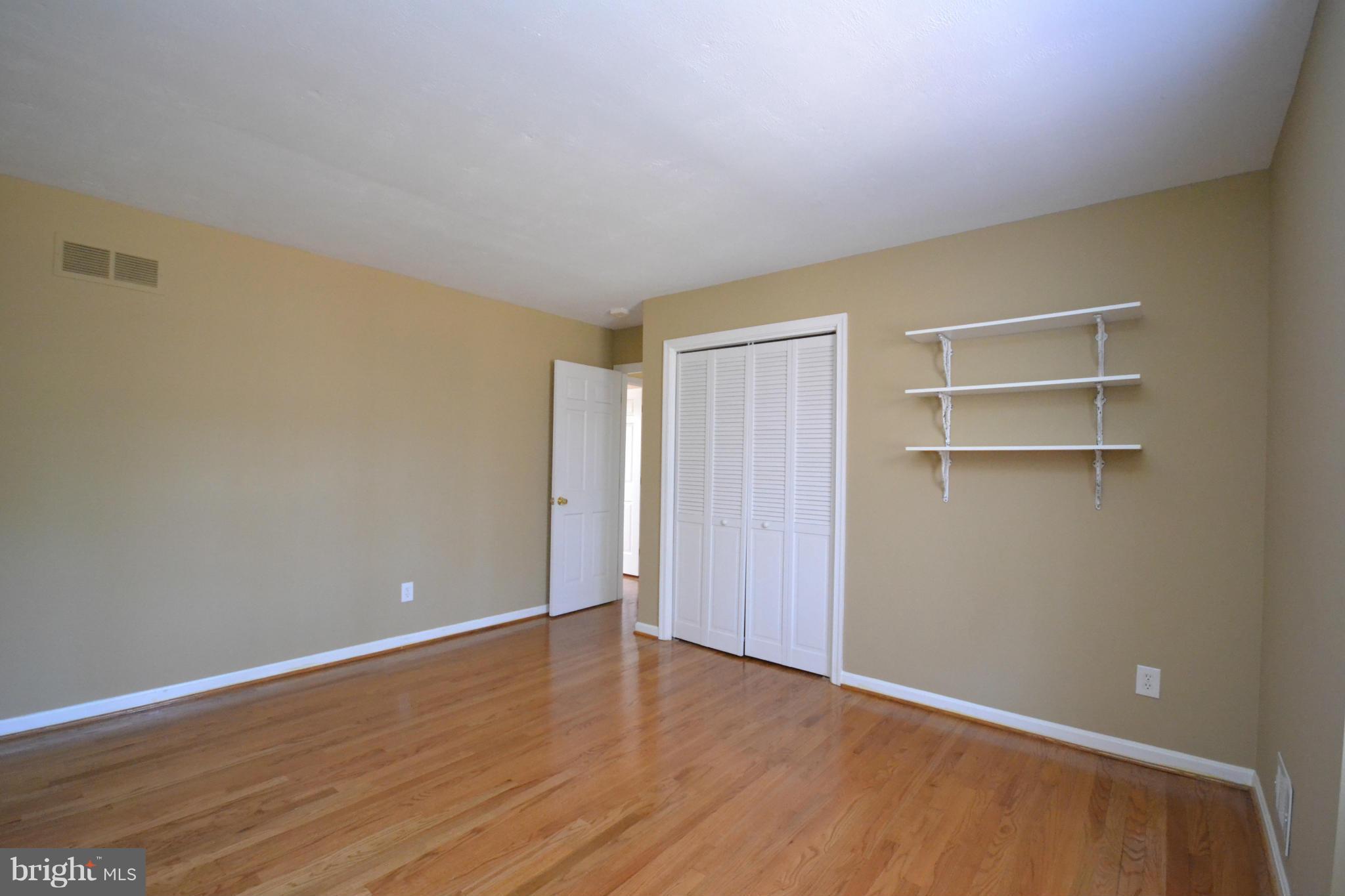 12909 Gent Road Reisterstown, MD 21136 - Photo 20 of 29 Bedroom 3 with large closet and hardwood floor.