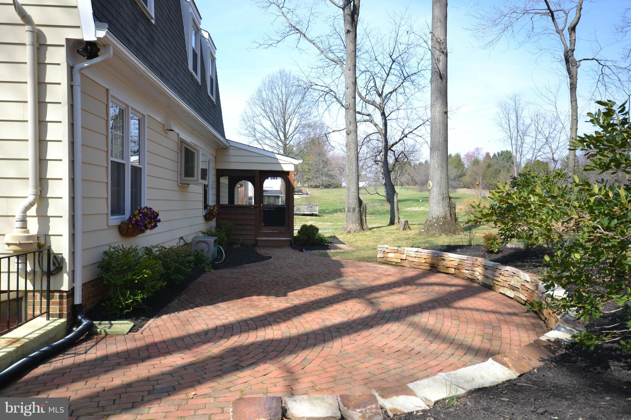 12909 Gent Road Reisterstown, MD 21136 - Photo 28 of 29 Lovely brick patio w/ stacked stone wall.