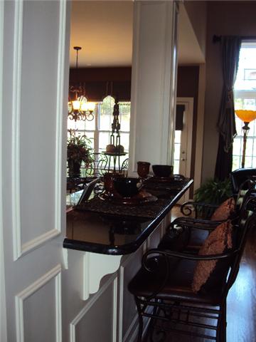 125 Circuit Road Franklin, TN 37064 - Photo 8 of 13 picture of model not actual home. Enjoy the additional seating for guest and the ability to interact with everyone from the klitchen.