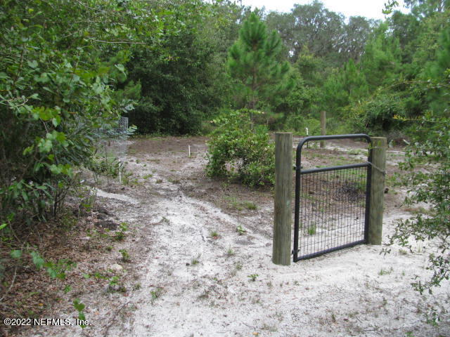 261 Byrd Road Crescent City, FL 32112 - Photo 19 of 35 GARDEN AREA WITH WATER FAUCET IMG_0034