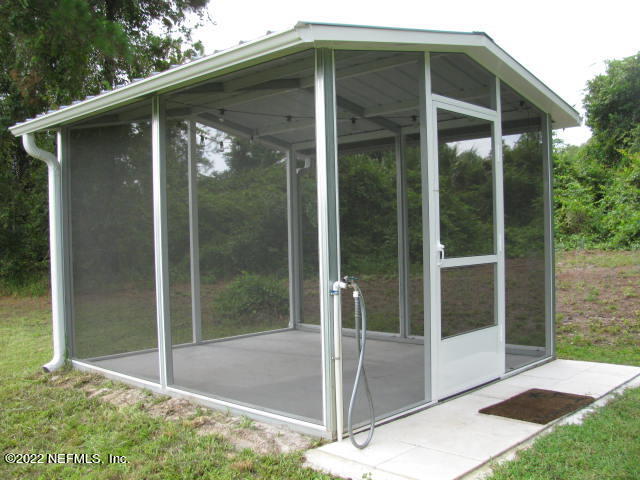 261 Byrd Road Crescent City, FL 32112 - Photo 21 of 35 SCREEN ROOM @ LAKE with Water Faucet IMG