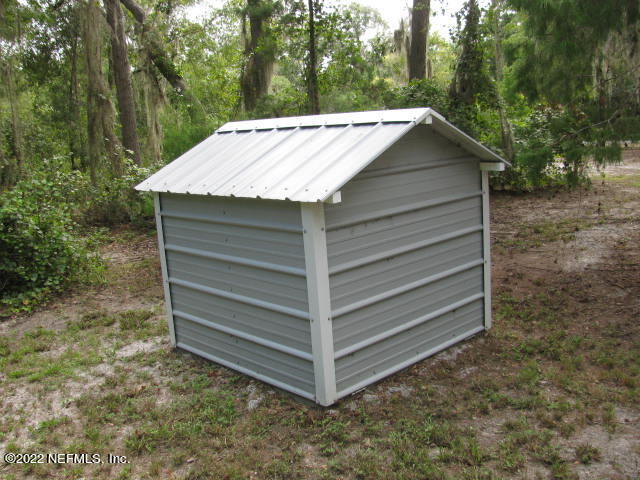 261 Byrd Road Crescent City, FL 32112 - Photo 8 of 35 WELL & PUMP SHED IMG_0005