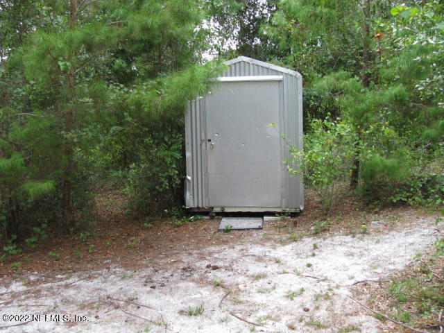 261 Byrd Road Crescent City, FL 32112 - Photo 9 of 35 LAKE STORAGE SHED IMG_0039