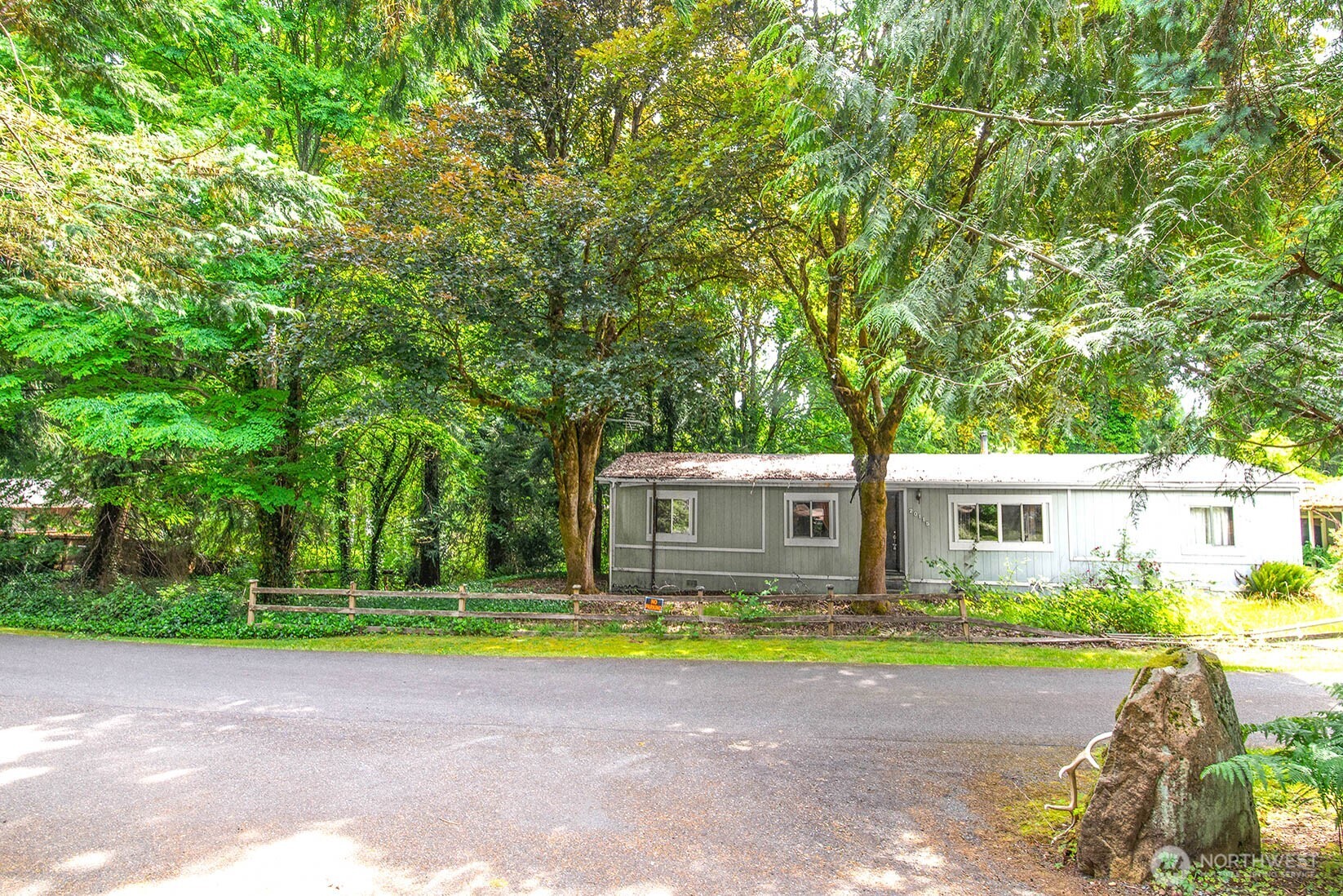 20115 49th Drive Southeast Bothell, WA 98012 - Photo 29 of 35 a view of a house with a big yard and large trees