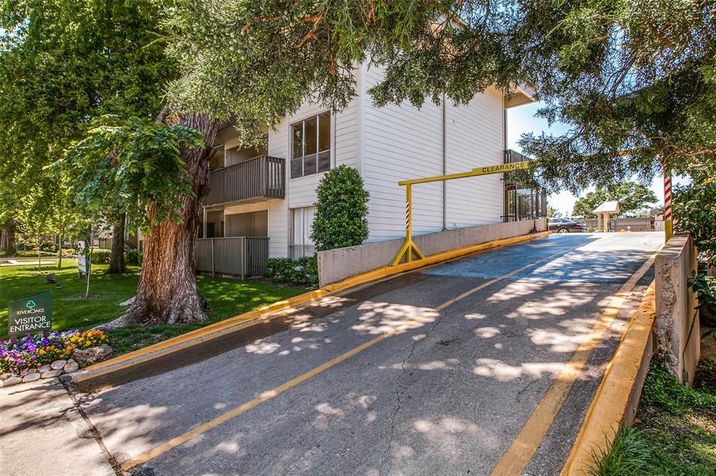 4859 Cedar Springs Road, Unit 254 Dallas, TX 75219 - Photo 14 of 14 a view of a house with a yard