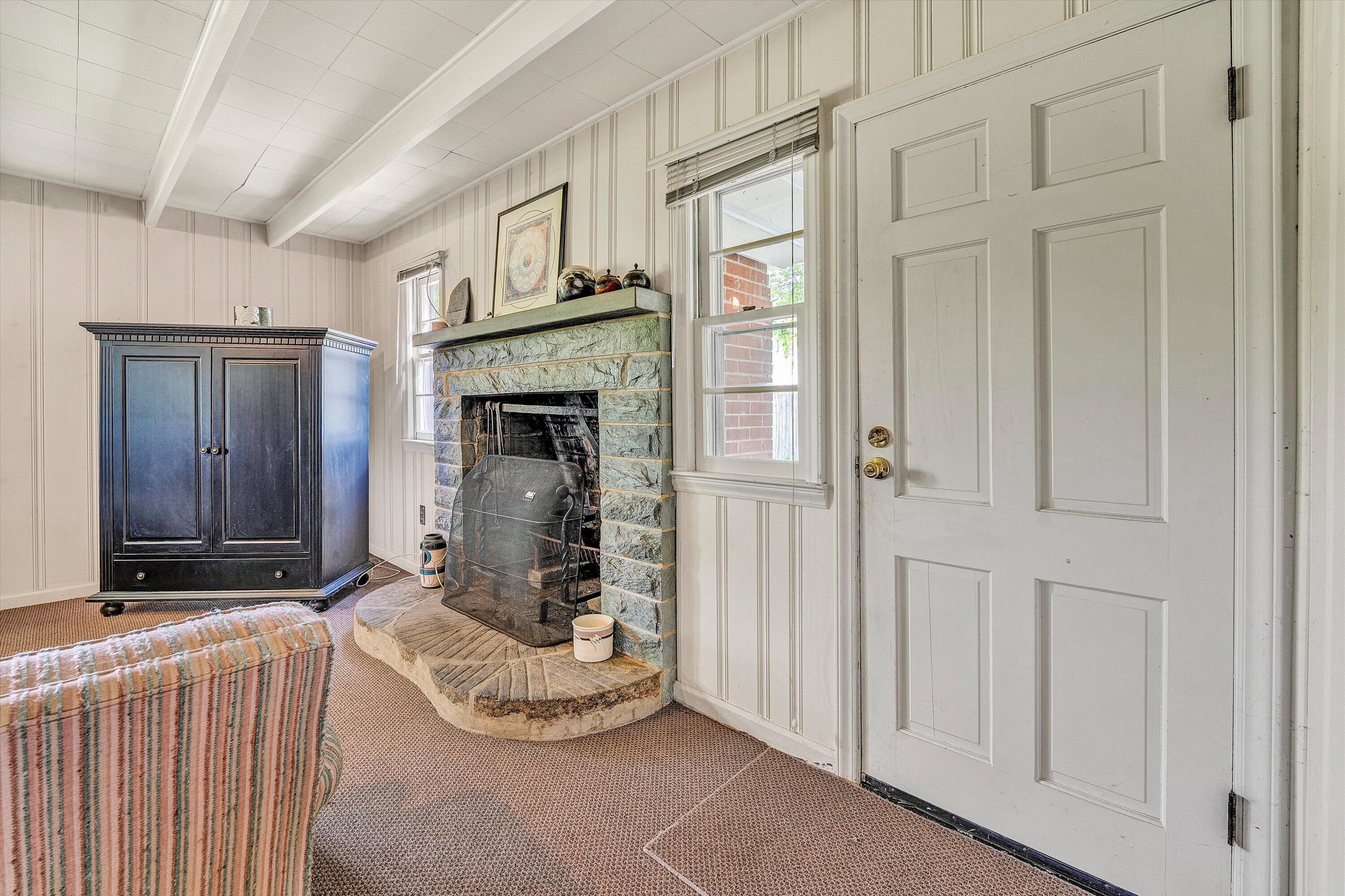 5328 White House Road Moneta, VA 24121 - Photo 5 of 39 a living room with fireplace furniture and a window