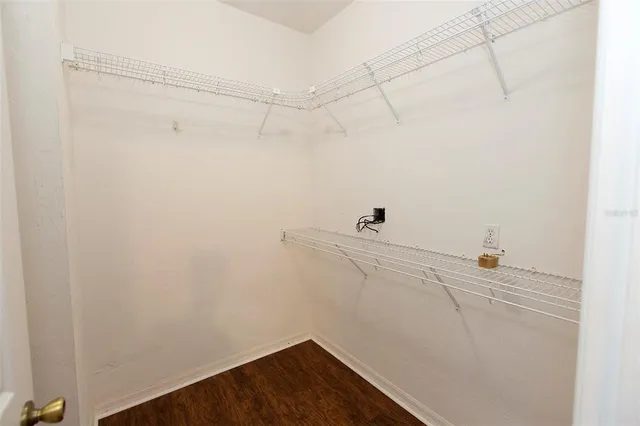 a view of a room with racks on the wall