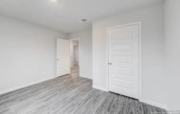 a view of kitchen with wooden floor