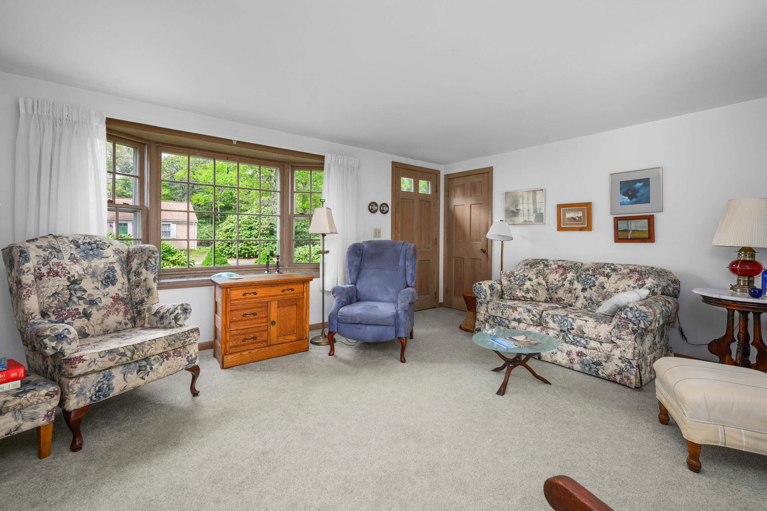 59 Beverly Road West Yarmouth, MA 02673 - Photo 16 of 33 a living room with furniture and a large window