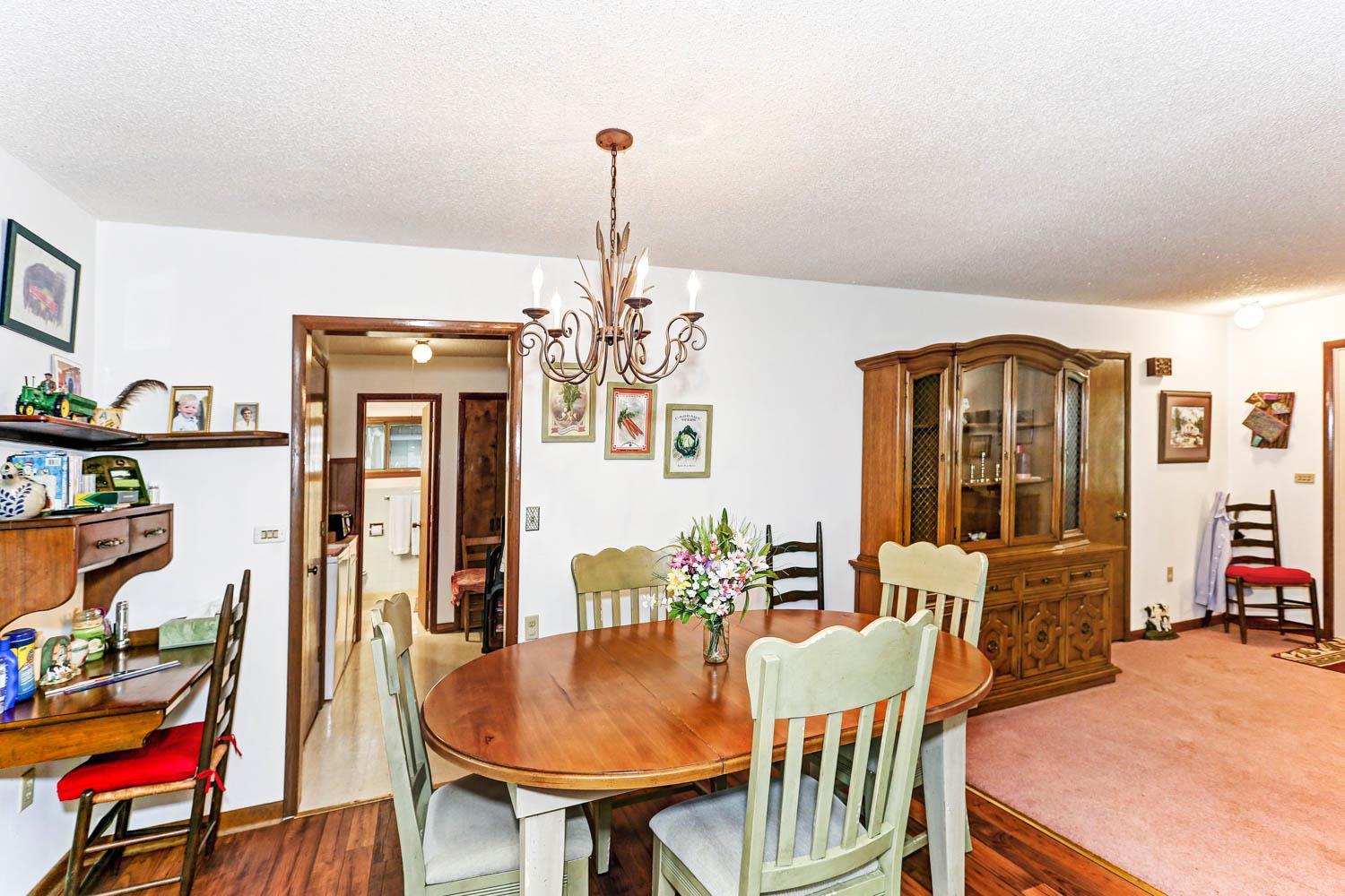 16 Elora Mountain Road Elora, TN 37328 - Photo 11 of 24 a view of a dining room with furniture and chandelier