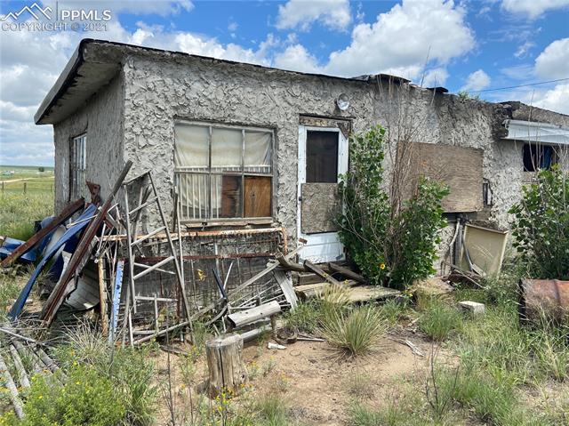 6451 South Johnson Road Rush, CO 80833 - Photo 36 of 46 South Side dilapidated building