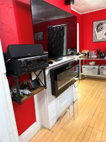 a kitchen with stainless steel appliances kitchen island granite countertop a stove a sink and a microwave