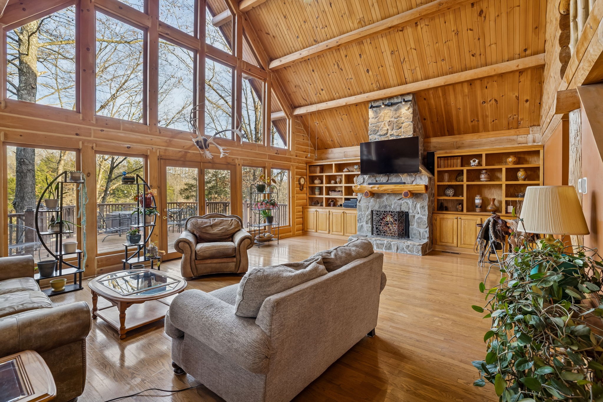 20151 Ben Fly Road Lyles, TN 37098 - Photo 13 of 98 a living room with fireplace furniture and a floor to ceiling window