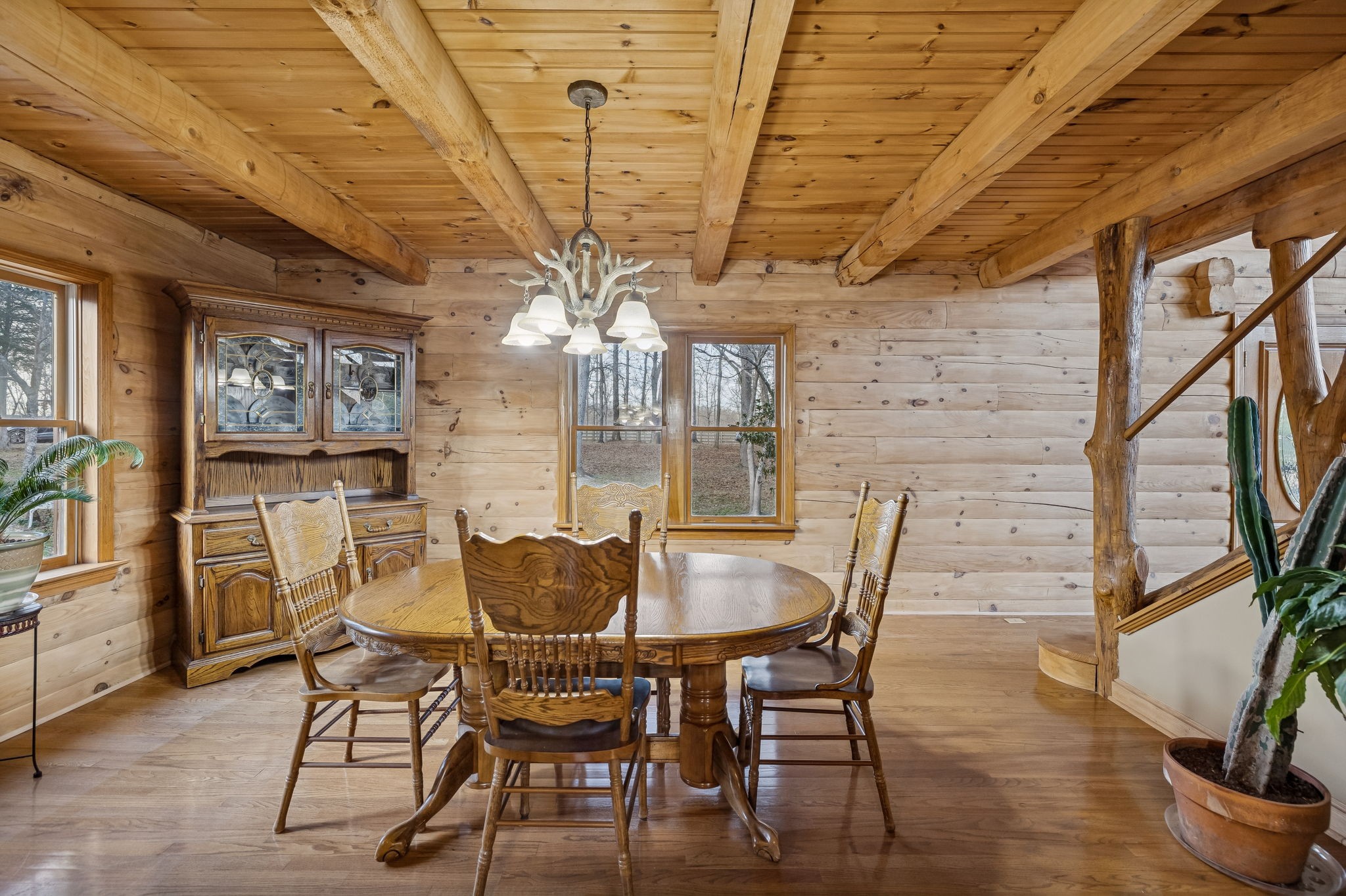 20151 Ben Fly Road Lyles, TN 37098 - Photo 20 of 98 a view of a dining room with furniture window and wooden floor