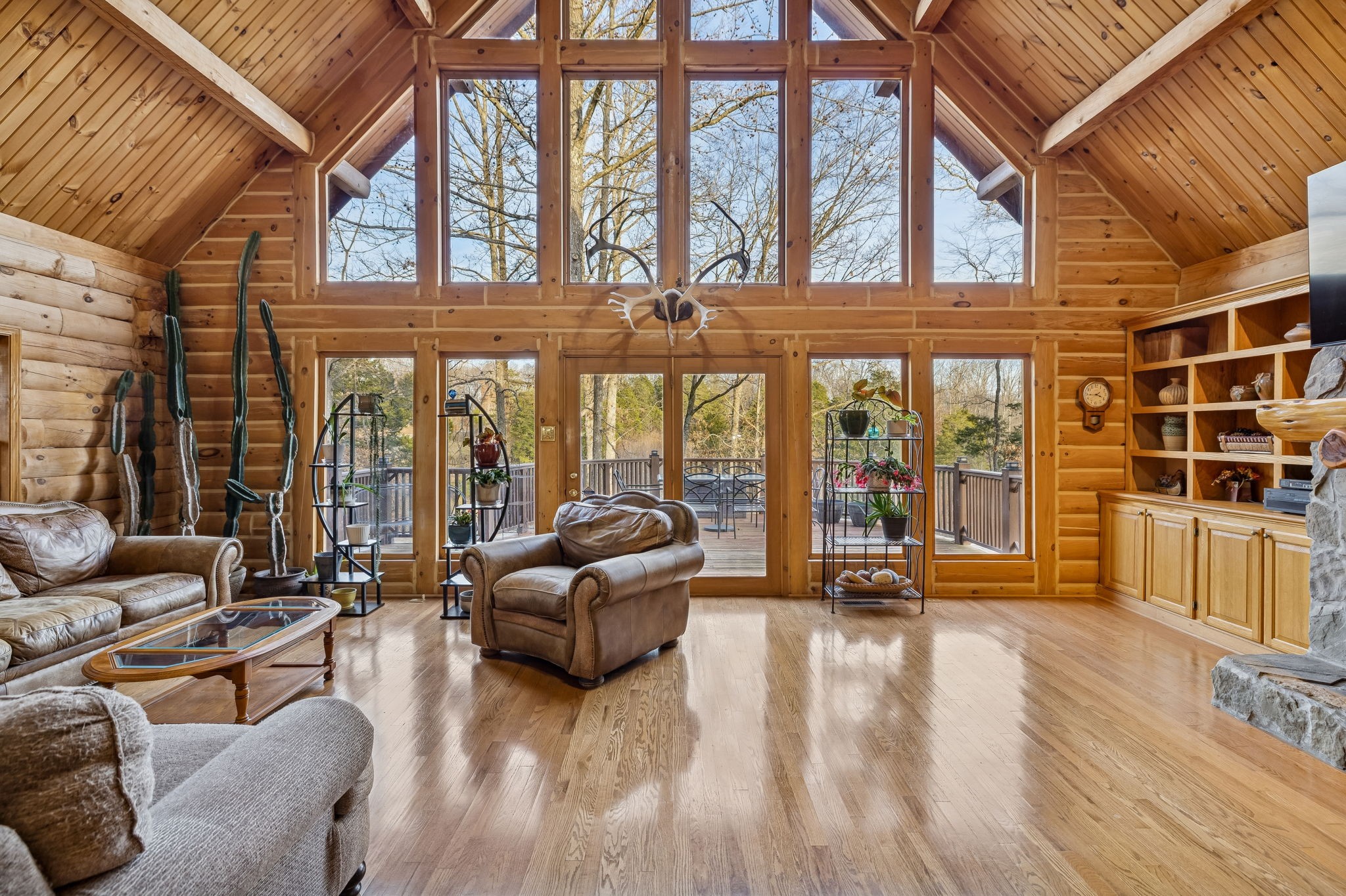 20151 Ben Fly Road Lyles, TN 37098 - Photo 26 of 98 a living room with furniture large windows and wooden floor