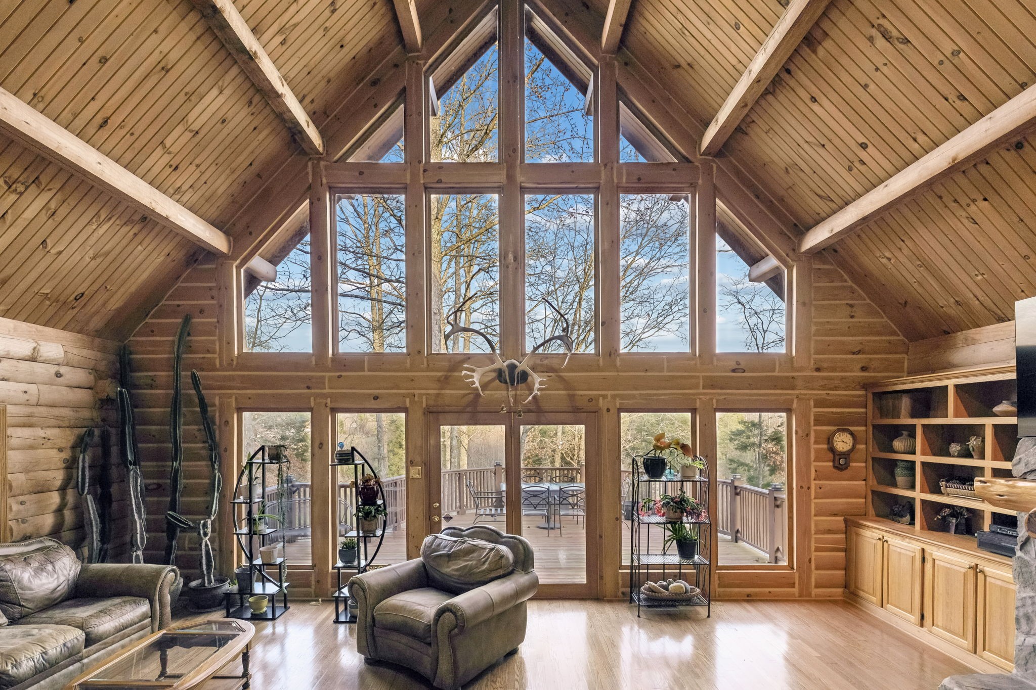 20151 Ben Fly Road Lyles, TN 37098 - Photo 28 of 98 a living room with furniture and floor to ceiling windows