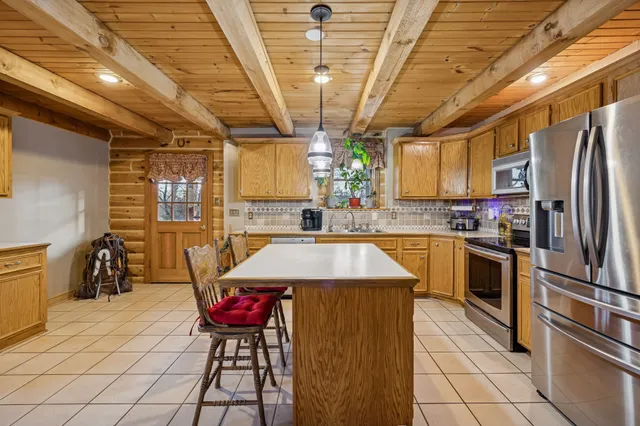 a view of balcony with wooden floor and outdoor space