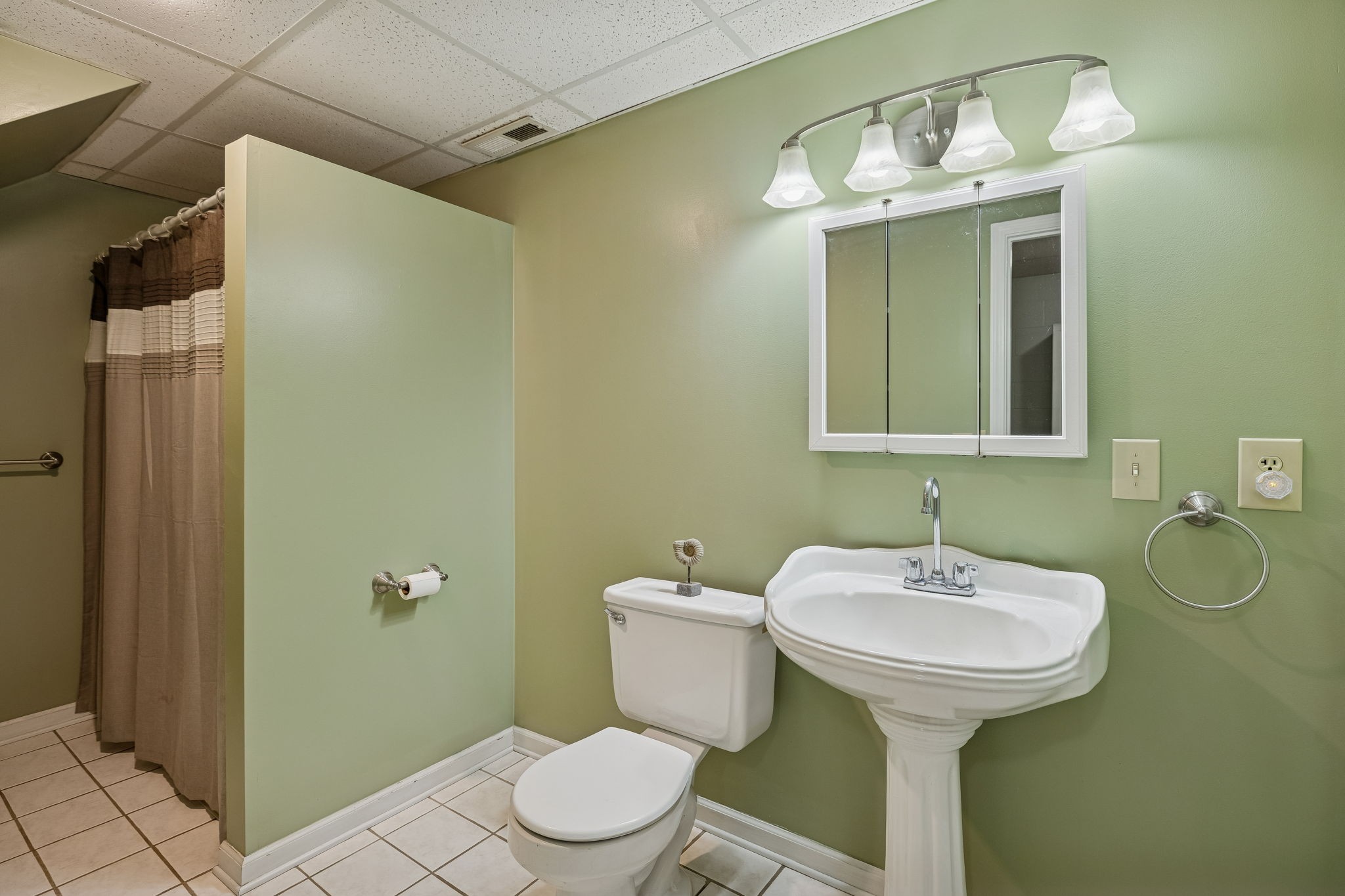 20151 Ben Fly Road Lyles, TN 37098 - Photo 50 of 98 a bathroom with a sink toilet and shower