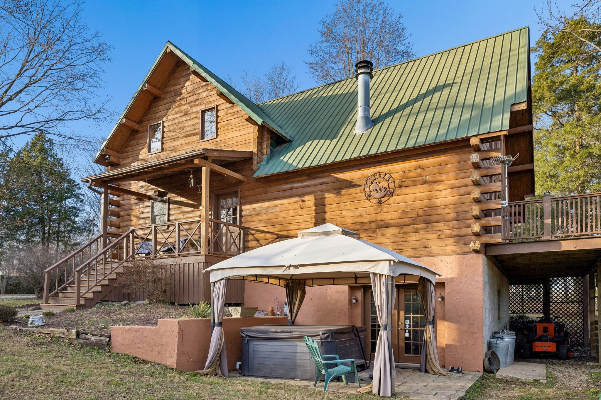 20151 Ben Fly Road Lyles, TN 37098 - Photo 65 of 98 a front view of a house with a garden