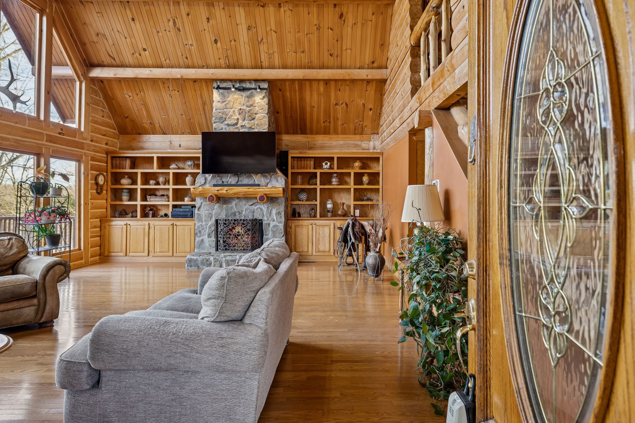 20151 Ben Fly Road Lyles, TN 37098 - Photo 10 of 98 a living room with furniture a flat screen tv and a fireplace