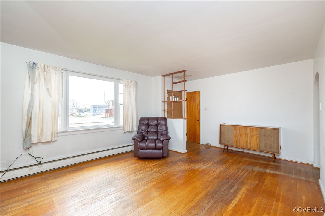 200 West Graham Road Richmond, VA 23222 - Photo 7 of 23 Unfurnished room with a baseboard radiator, arched