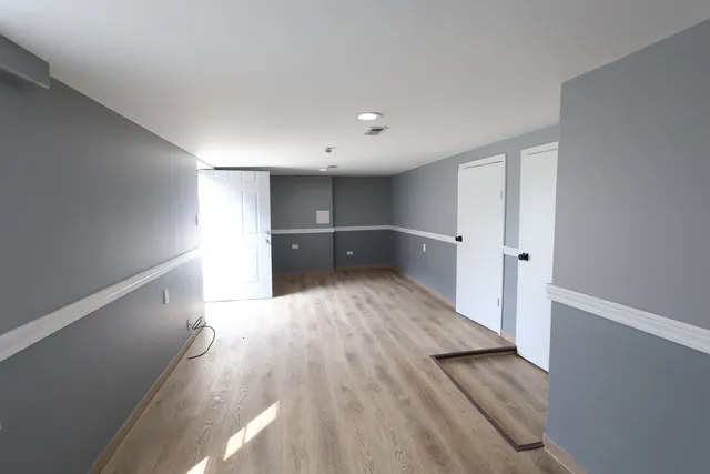 wooden floor in an empty room with an empty room