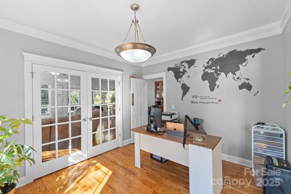 1761 Lakeland Trail Drive Tega Cay, SC 29708 - Photo 11 of 46 a view of a workspace with furniture and a window