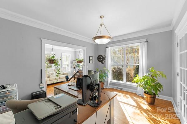 1761 Lakeland Trail Drive Tega Cay, SC 29708 - Photo 12 of 46 a view of a livingroom with furniture and a potted plant