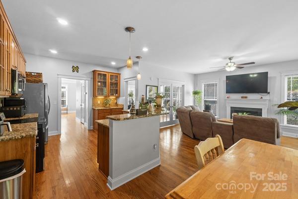 1761 Lakeland Trail Drive Tega Cay, SC 29708 - Photo 18 of 46 a living room with fireplace furniture and a flat screen tv