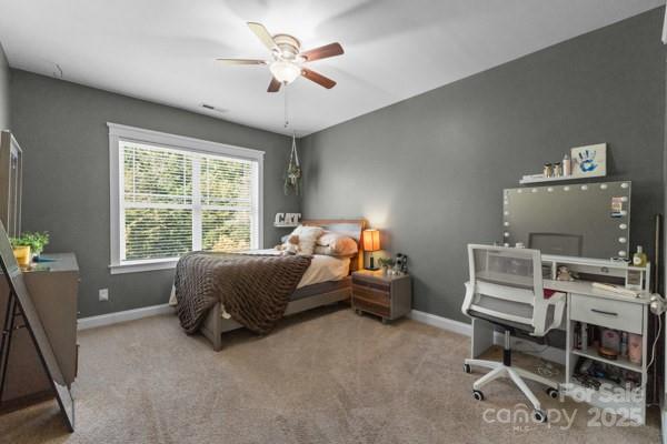 1761 Lakeland Trail Drive Tega Cay, SC 29708 - Photo 28 of 46 a bedroom with furniture and a window