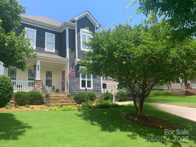 1761 Lakeland Trail Drive Tega Cay, SC 29708 - Photo 3 of 46 a front view of a house with a yard
