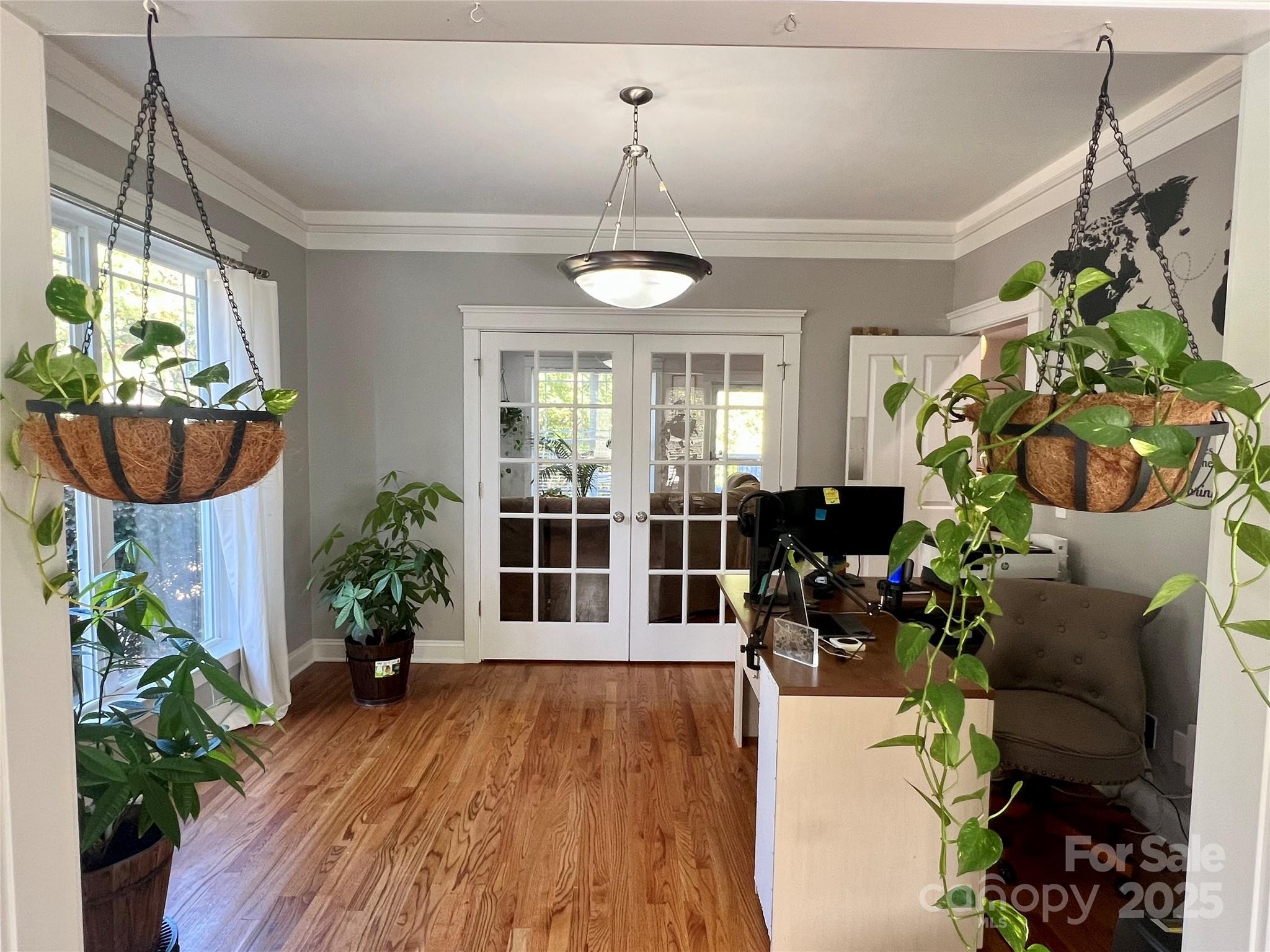1761 Lakeland Trail Drive Tega Cay, SC 29708 - Photo 10 of 46 a view of a dining room with furniture window and wooden floor