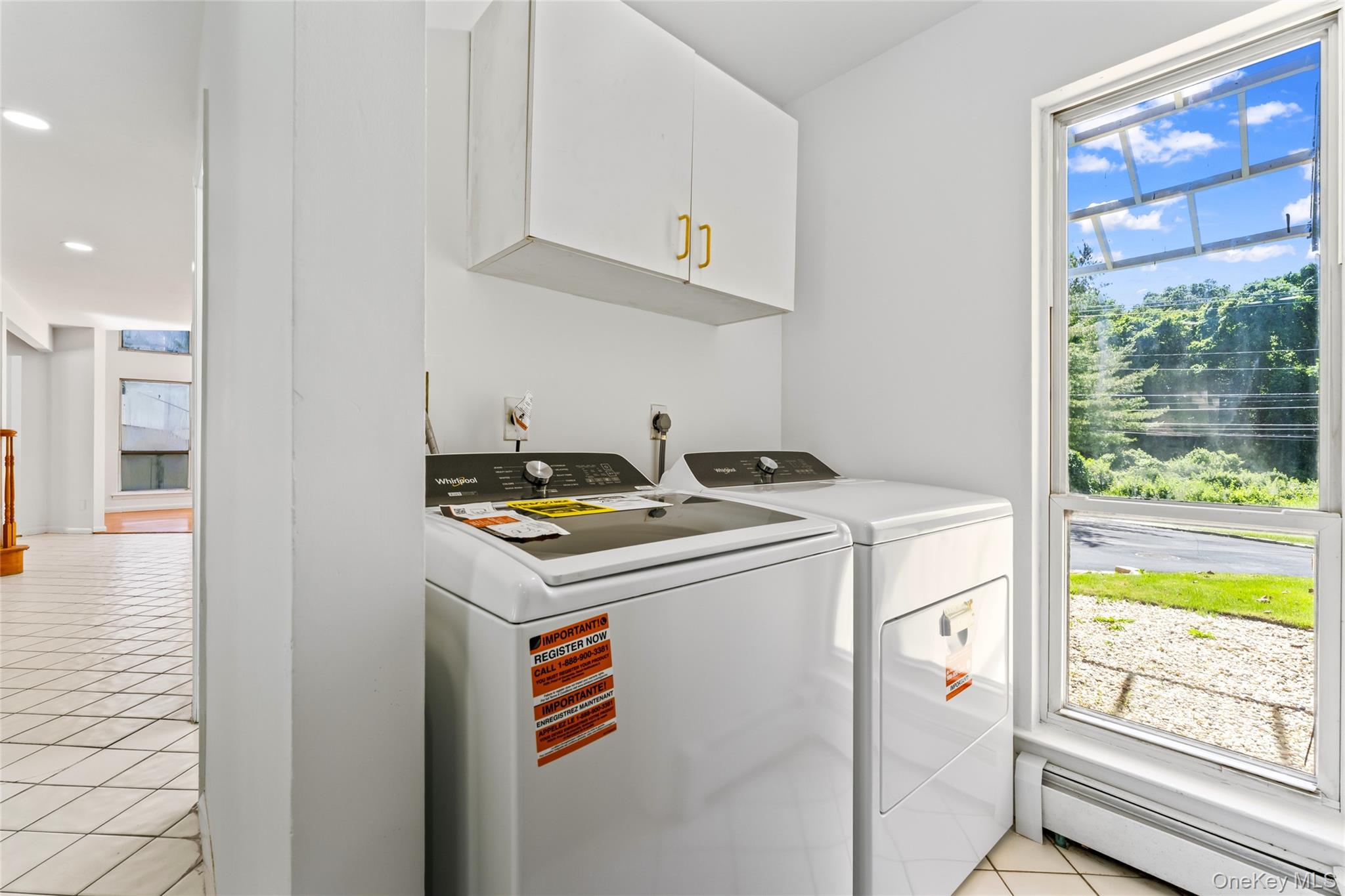 126 Bagatelle Road Melville, NY 11747 - Photo 22 of 50 a utility room with washer and dryer