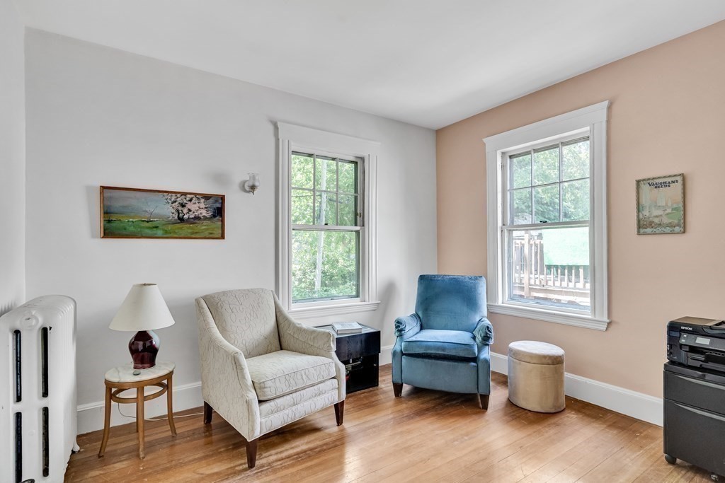 125 Sumner Road, Unit 1 Brookline, MA 02445 - Photo 16 of 22 a living room with furniture and a window