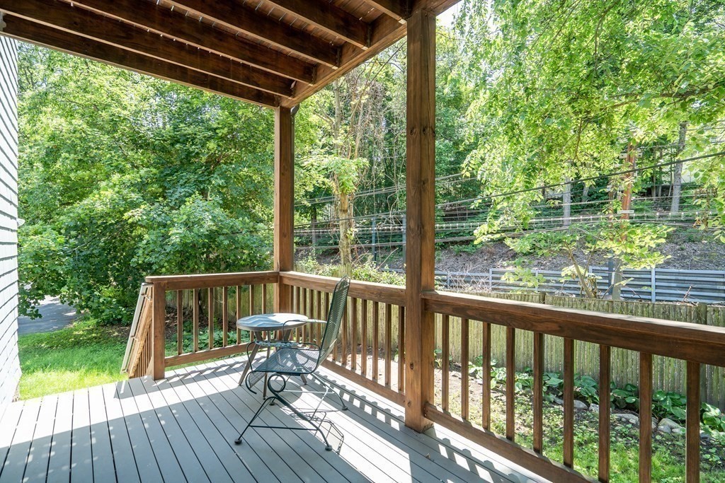 125 Sumner Road, Unit 1 Brookline, MA 02445 - Photo 20 of 22 a view of a two chairs in the deck