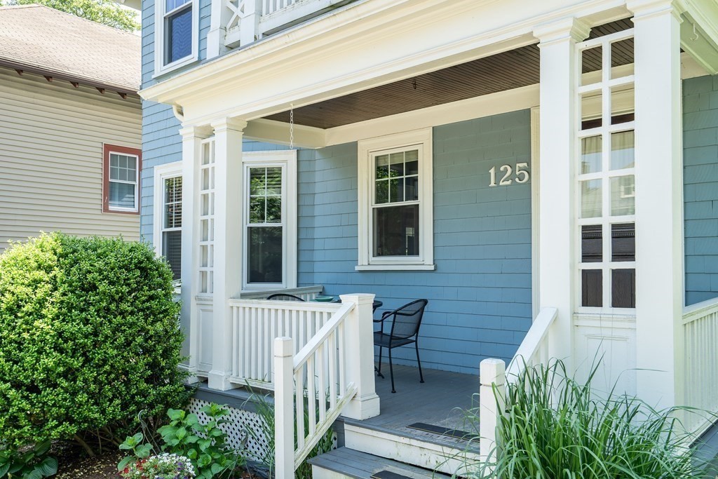 125 Sumner Road, Unit 1 Brookline, MA 02445 - Photo 3 of 22 a front view of a house with a porch