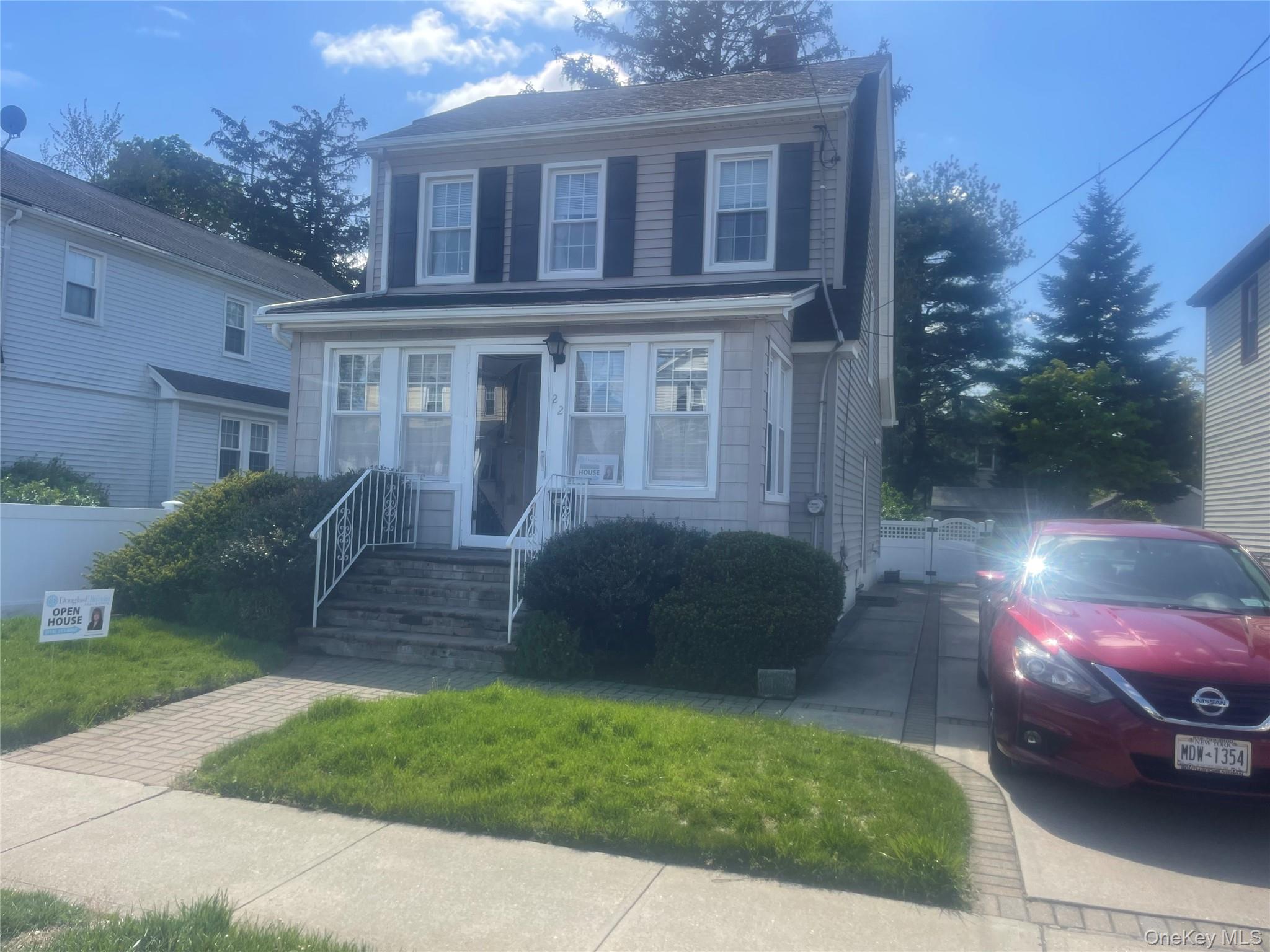22 Eton Street Valley Stream, NY 11581 - Photo 1 of 30 a front view of a house with a yard