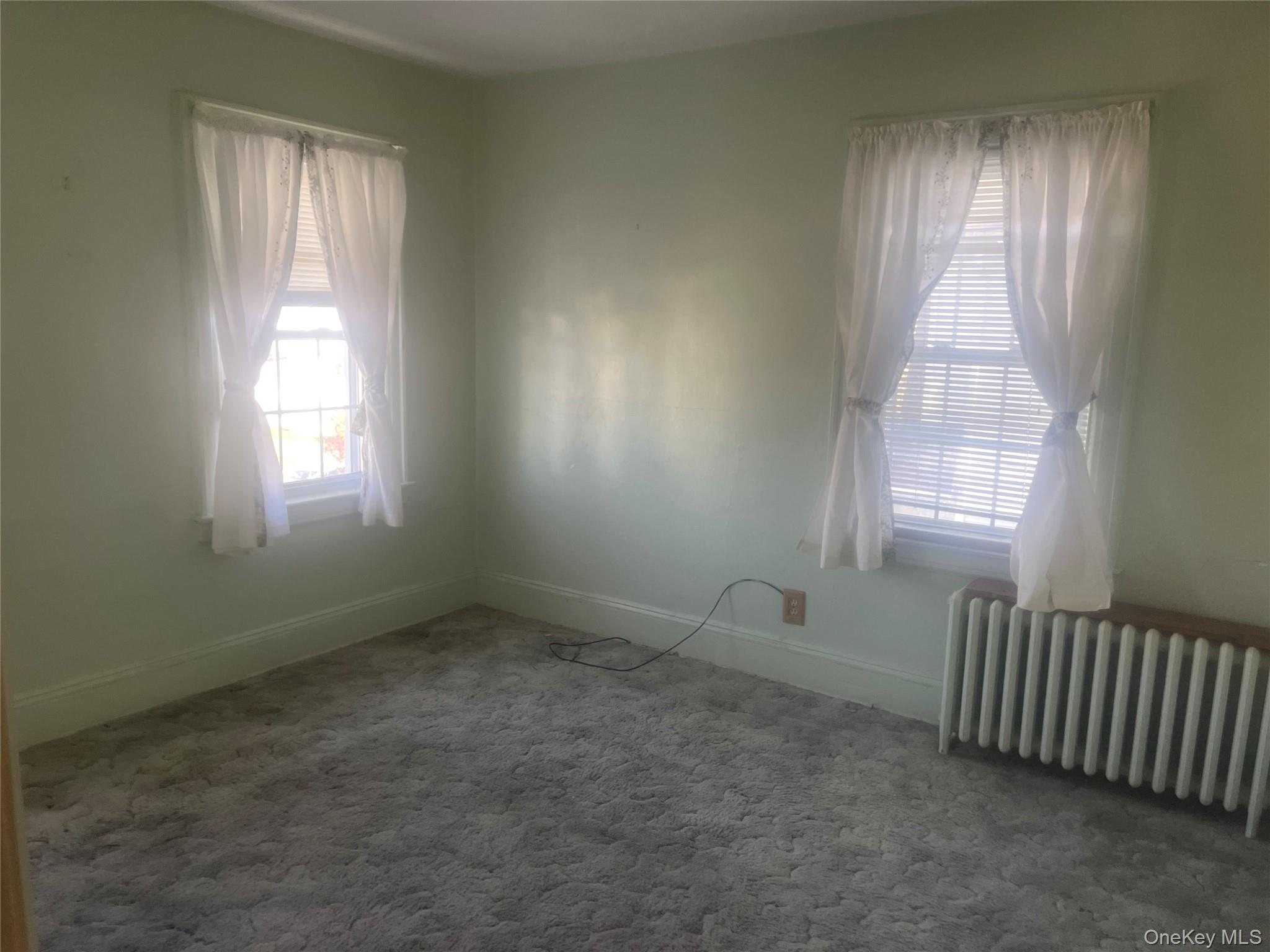 22 Eton Street Valley Stream, NY 11581 - Photo 15 of 30 an empty room with windows